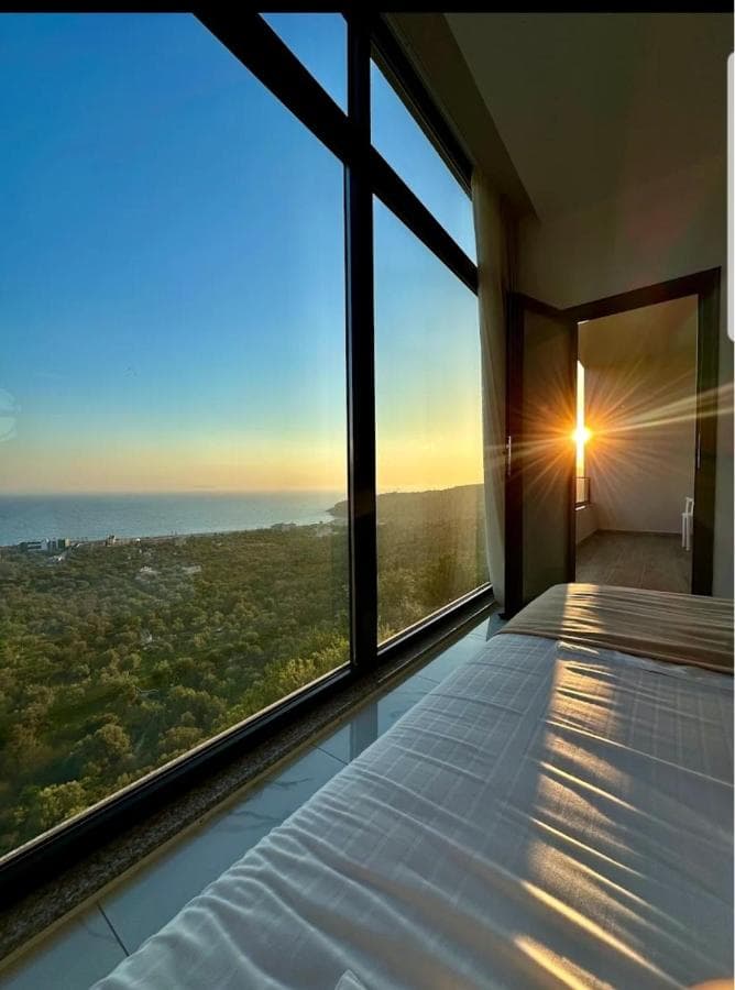 Sunrise through a guest-room balcony
